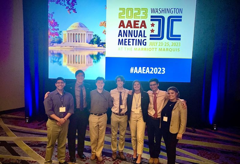 LSU team members pose on stage at ag-econ competition