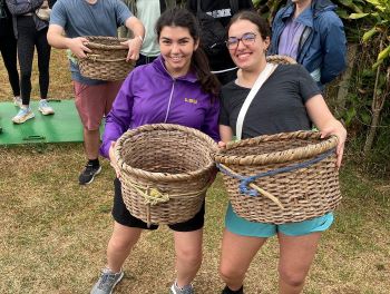 Two women holding baskets