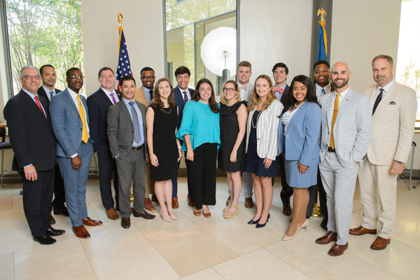 Group of students pose for photo with Governor Edwards