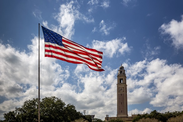 LSU Memorial Tower with US Flag