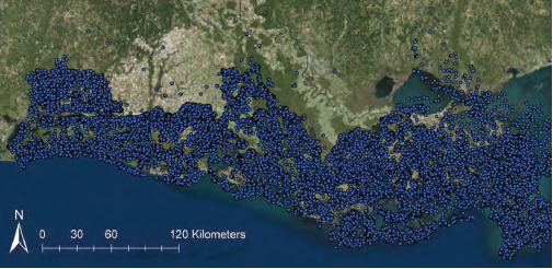 map of Louisiana coast filled with blue dots marking oil well locations
