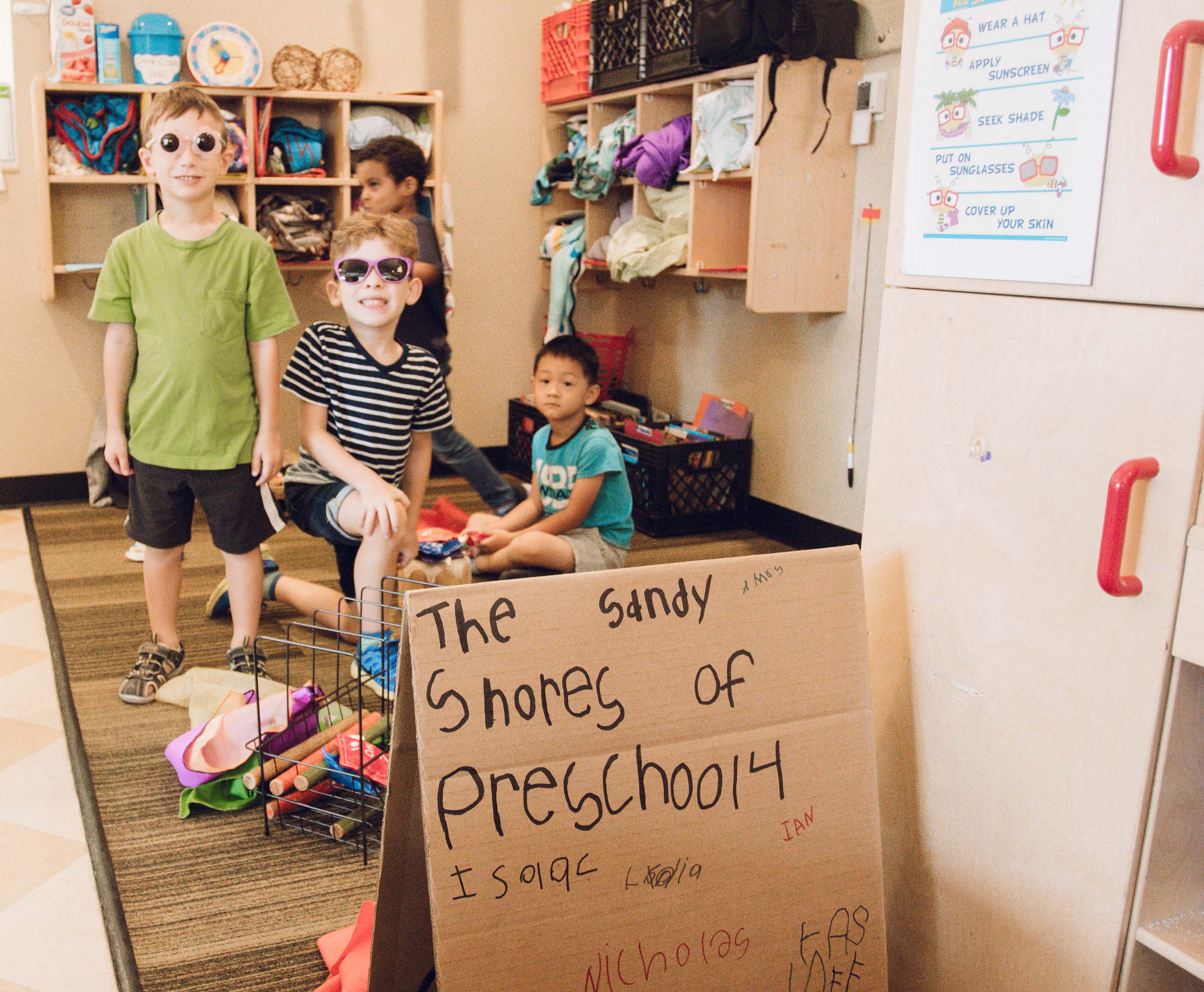 children wearing sunglasses at the LSU Early Childhood Education Lab Preschool