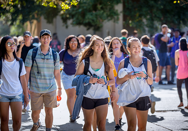 Students walking to class through the quad on the first day of the fall semester.