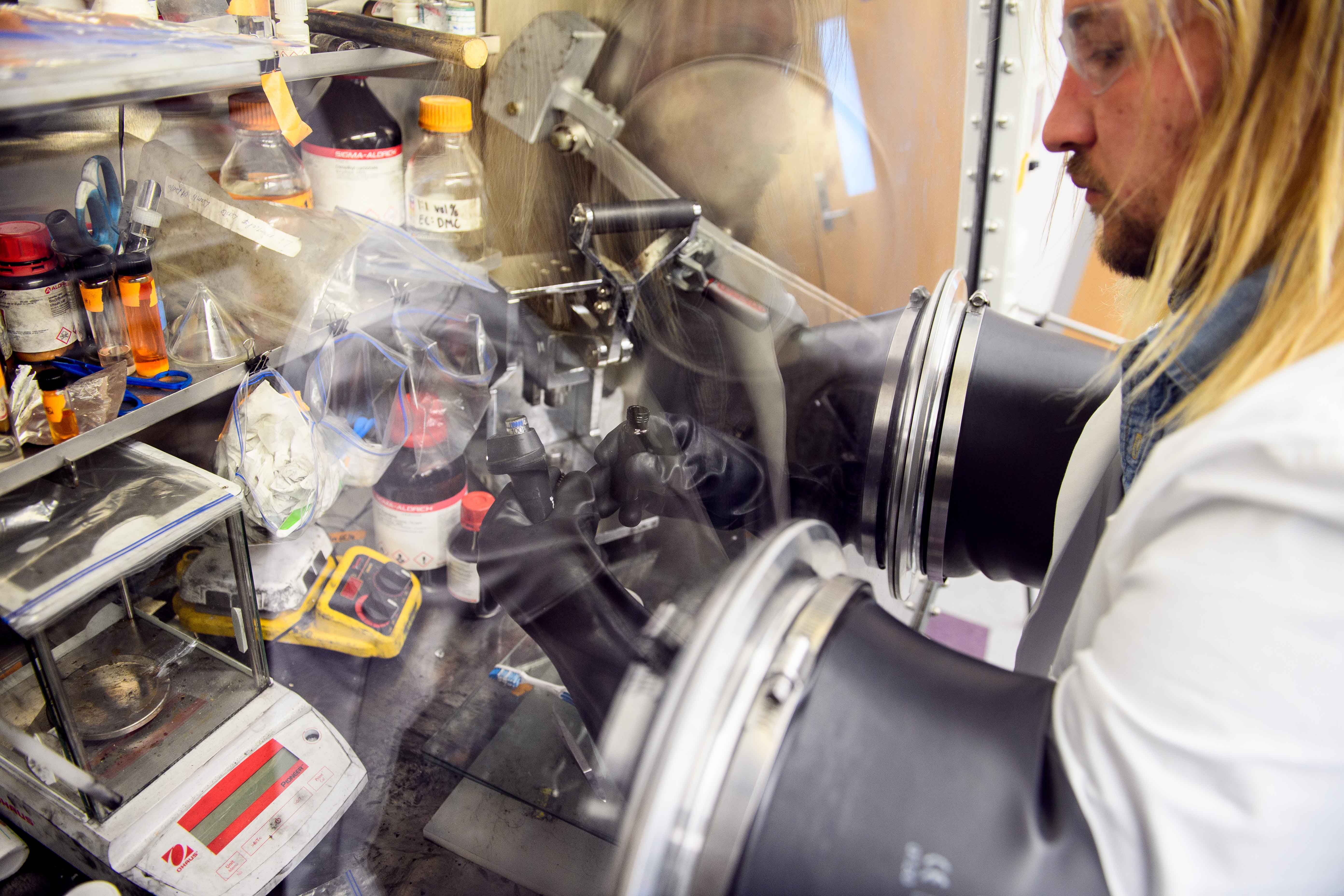 Ben Peterson doing experiment in lab