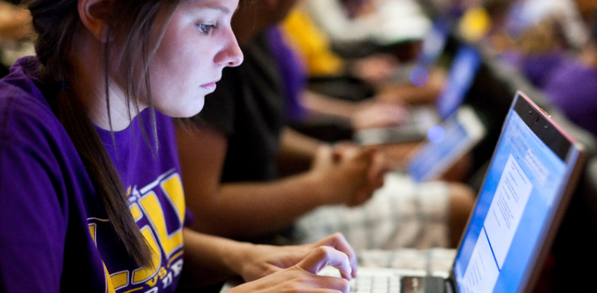 photo: online student with laptop