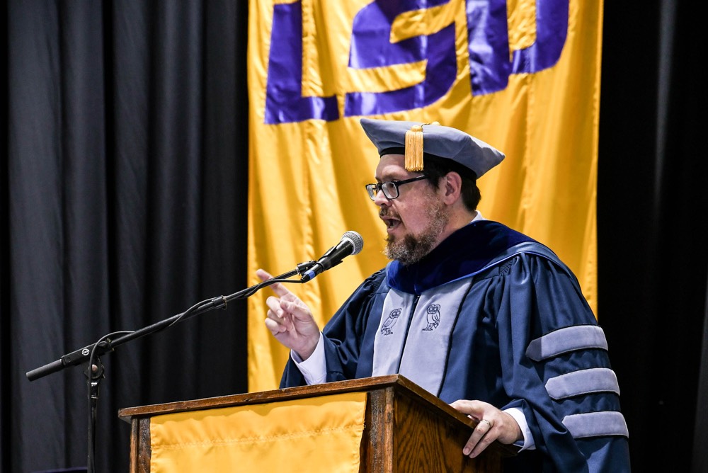 Martin Johnson giving a graduation speech