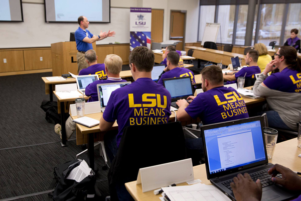 EBV participants in classroom with LSU Means Business shirts