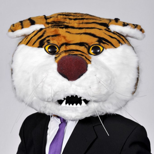 A photo of Mike the Tiger wearing a suit.