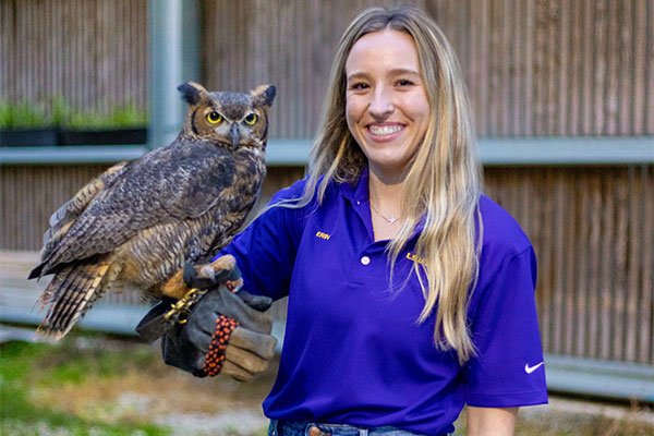 Erin Schwalbe with great horned owl